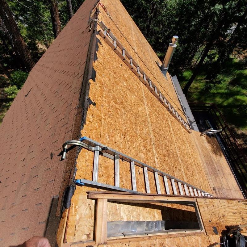 Asphalt roof decking replacement on cabin roof
