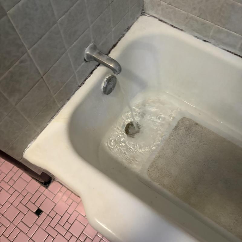 Tub drain clearing with cable and trap cleaning