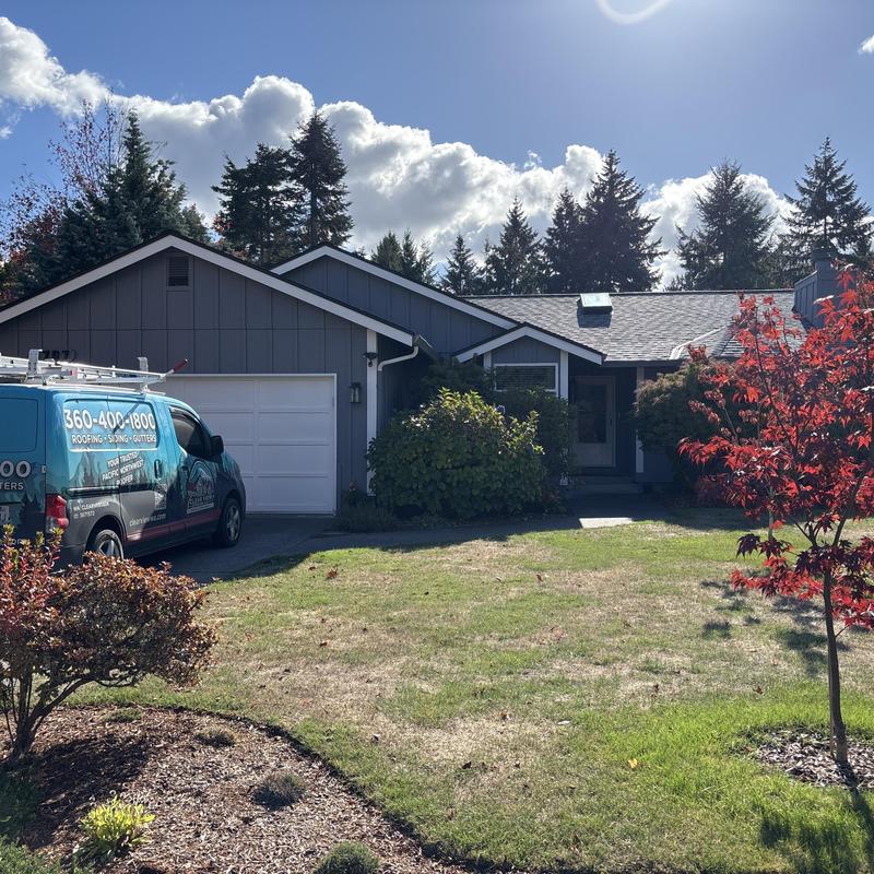 Skylight cleaning on residential roof in Hayden, ID
