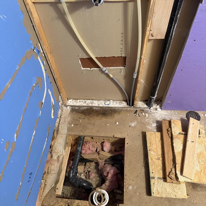 Tub shower drain and rough-in valve installation site Tub shower drain and rough-in valve installation site