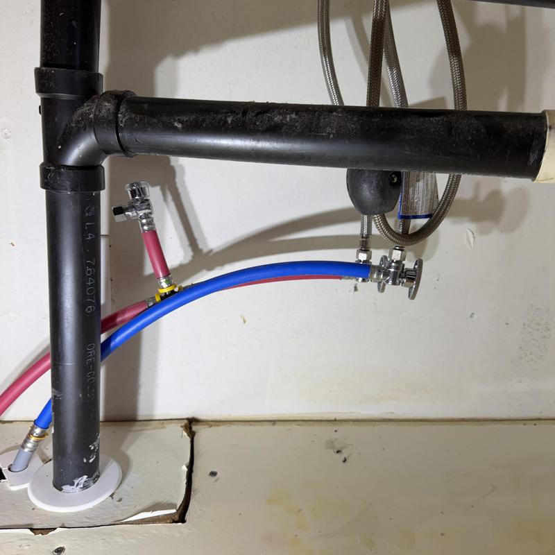 PEX water supply lines with new angle stops below sink PEX water supply lines with new angle stops below sink