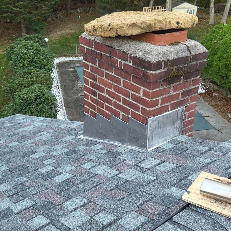 Chimney flashing with asphalt shingle roof in Gales Ferry CT Chimney flashing with asphalt shingle roof in Gales Ferry CT