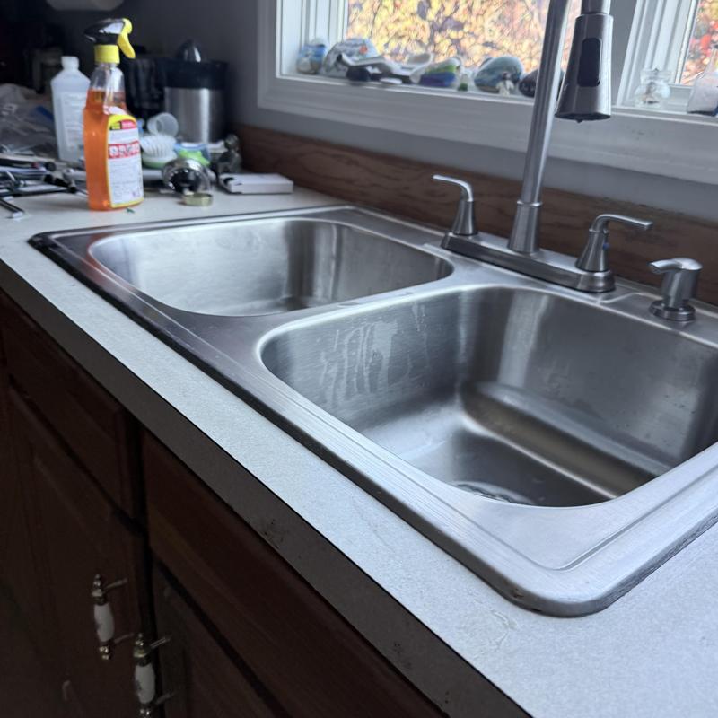 Kitchen sink with faucet and disposal installation