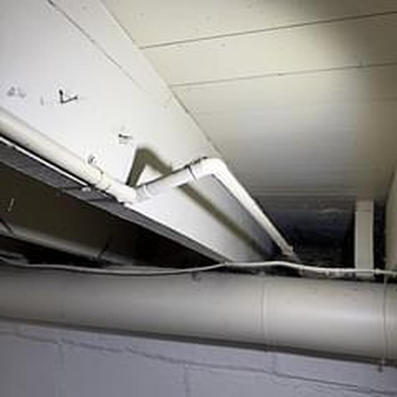 PVC water pipe installation in basement ceiling