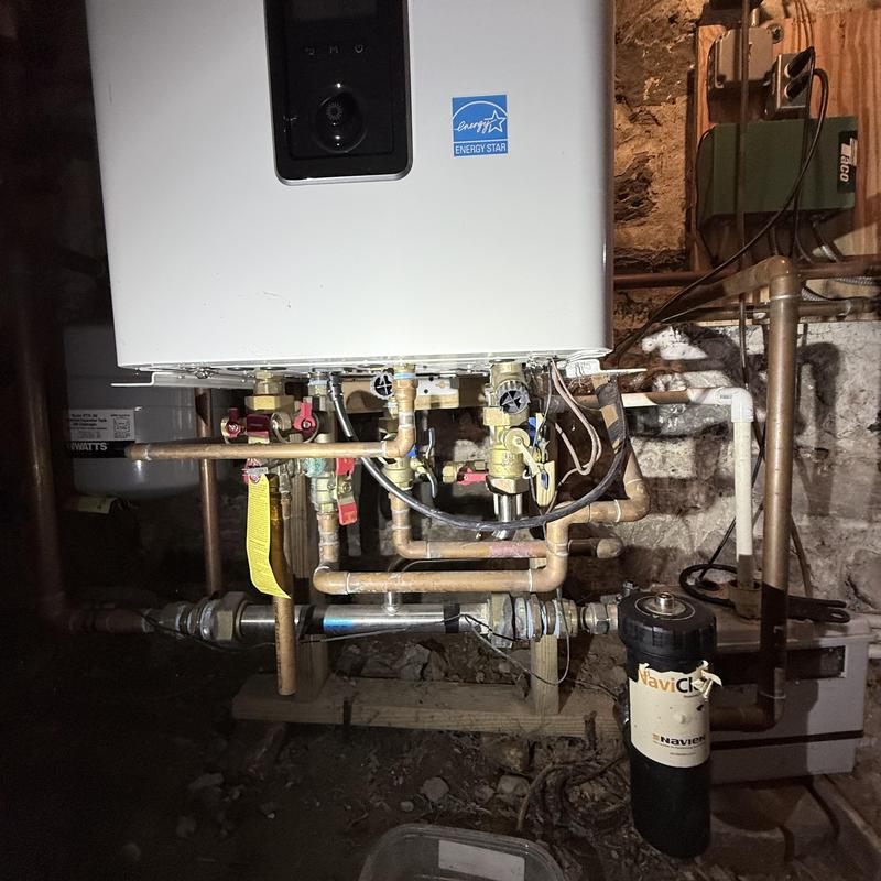 Tankless water heater with copper piping system
