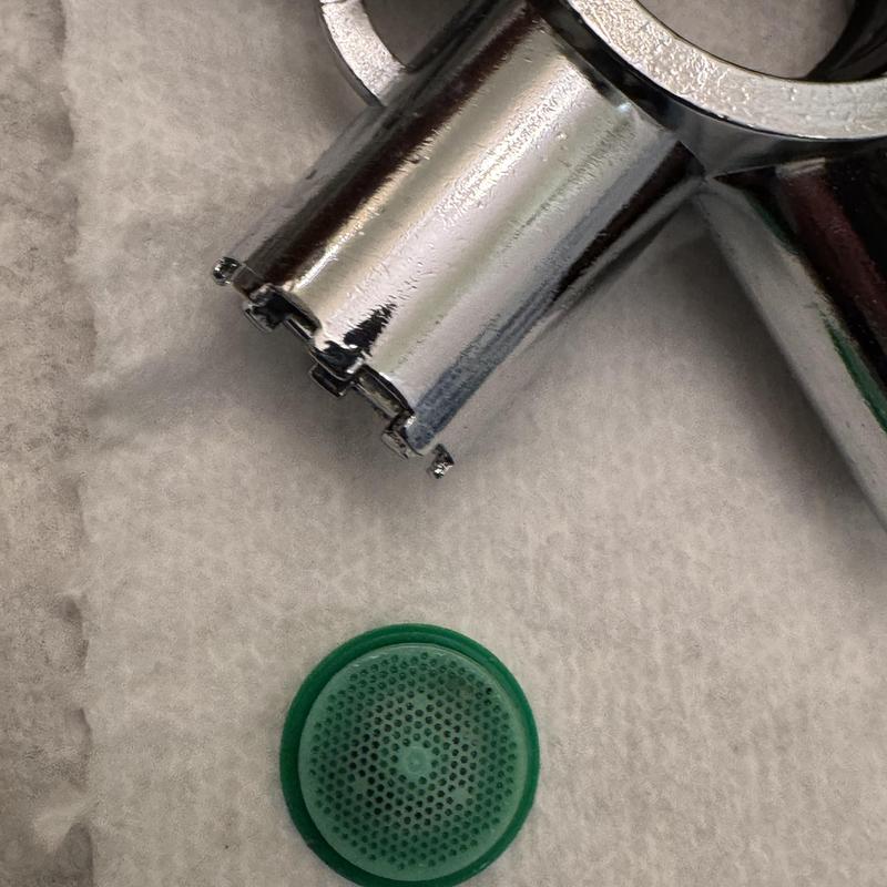 Delta bathroom faucet aerator removed for cleaning Delta bathroom faucet aerator removed for cleaning