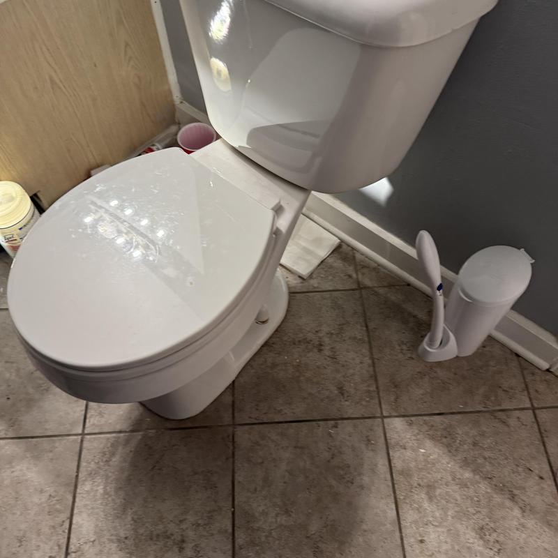 Toilet flange with new wax ring and closet bolts Toilet flange with new wax ring and closet bolts