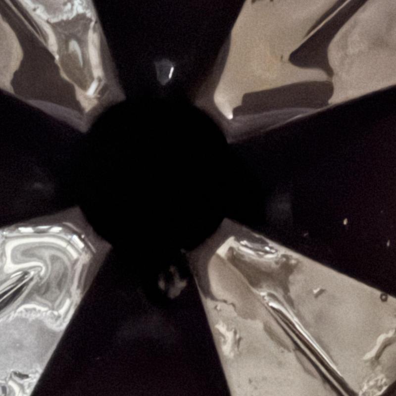 Garbage disposal blades with clogged potato skins inside