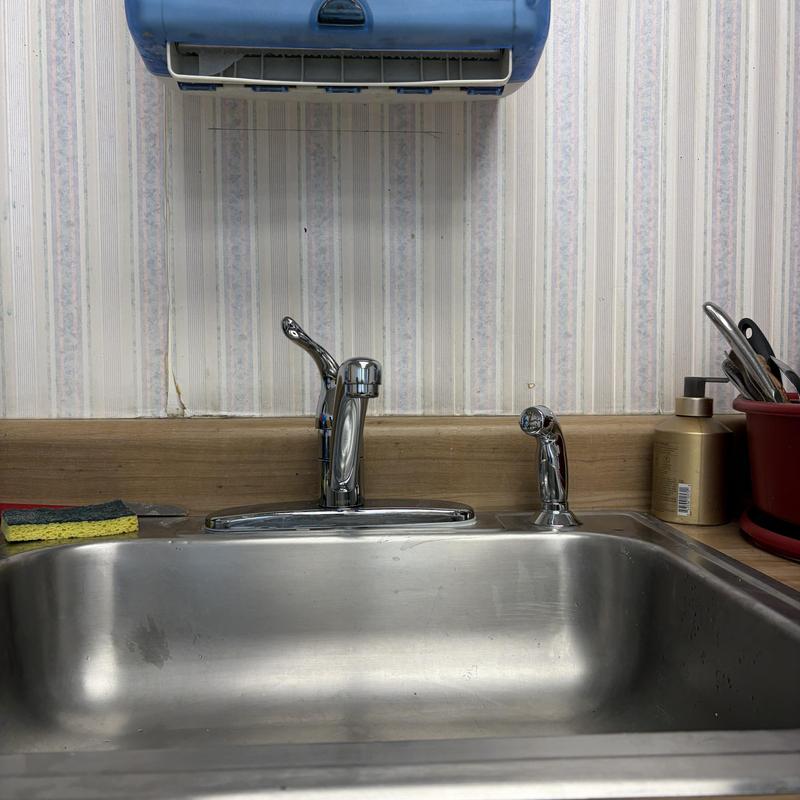 Kitchen faucet and soap dispenser with sink basin