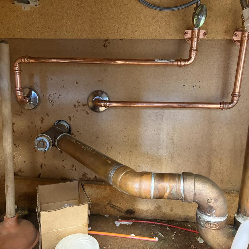 Copper water supply lines and drain pipe installation