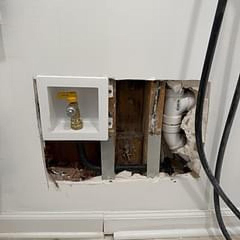 Gas line valve and outside hose faucet installation hole in wall Gas line valve and outside hose faucet installation hole in wall
