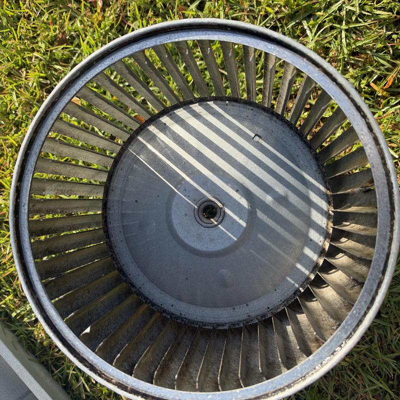 Blower wheel from residential split heating system dirt buildup