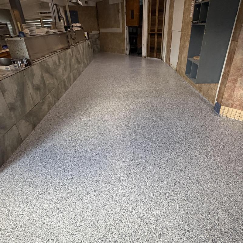 Epoxy flake flooring with polyaspartic top-coat in kitchen